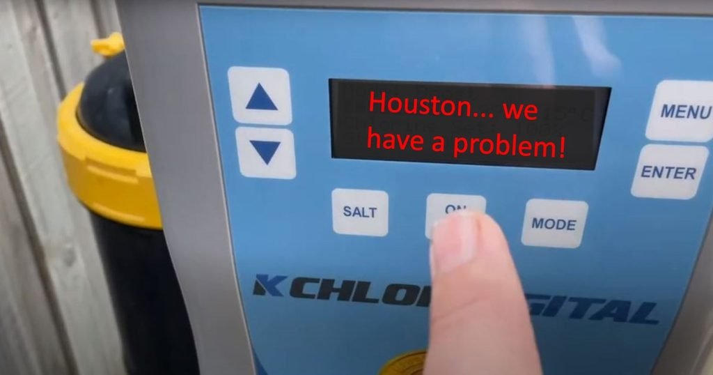 Pool technician troubleshooting salt system control board display with error code